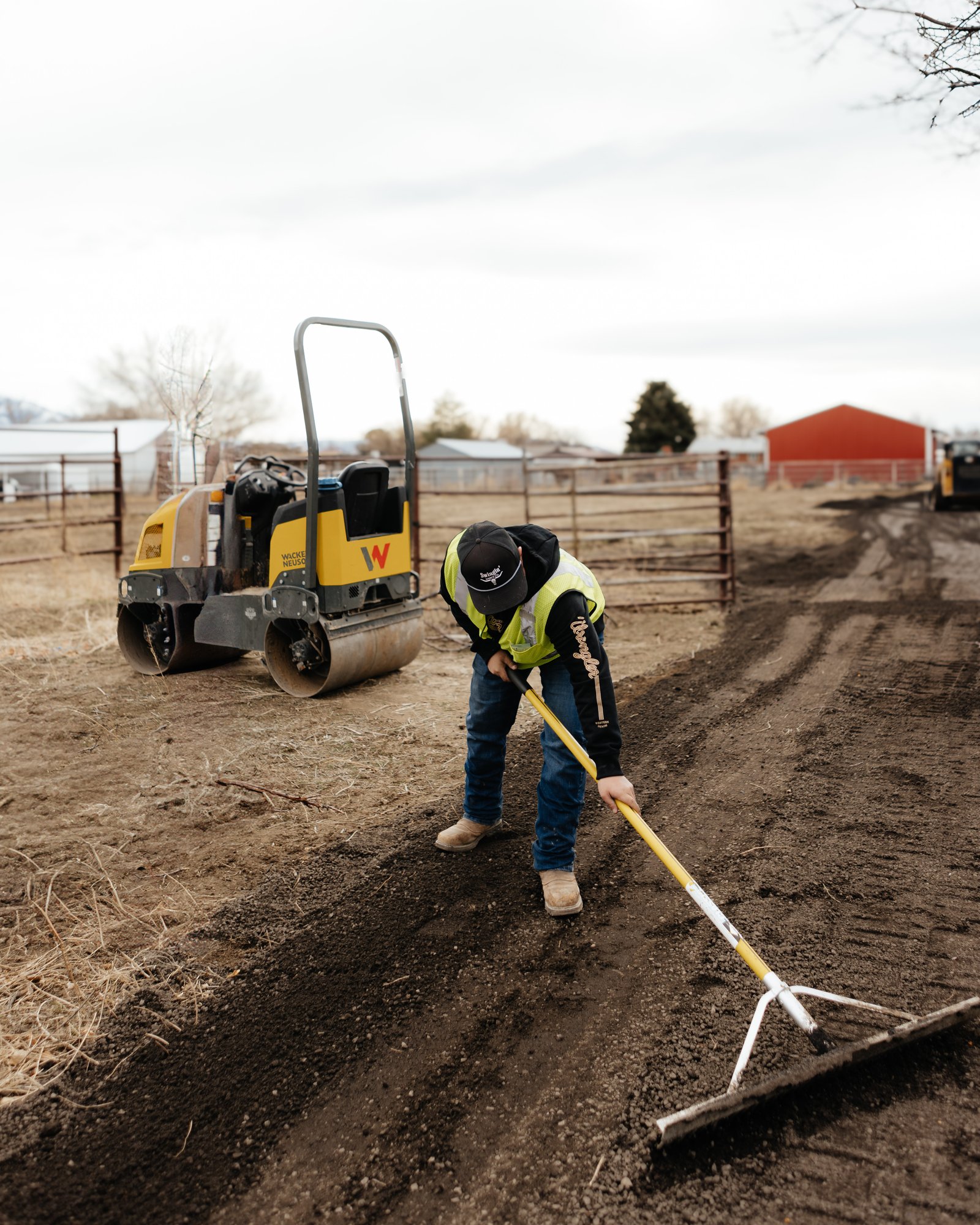 J&C Asphalt crew repairing a damaged driveway near Spanish Fork, UT